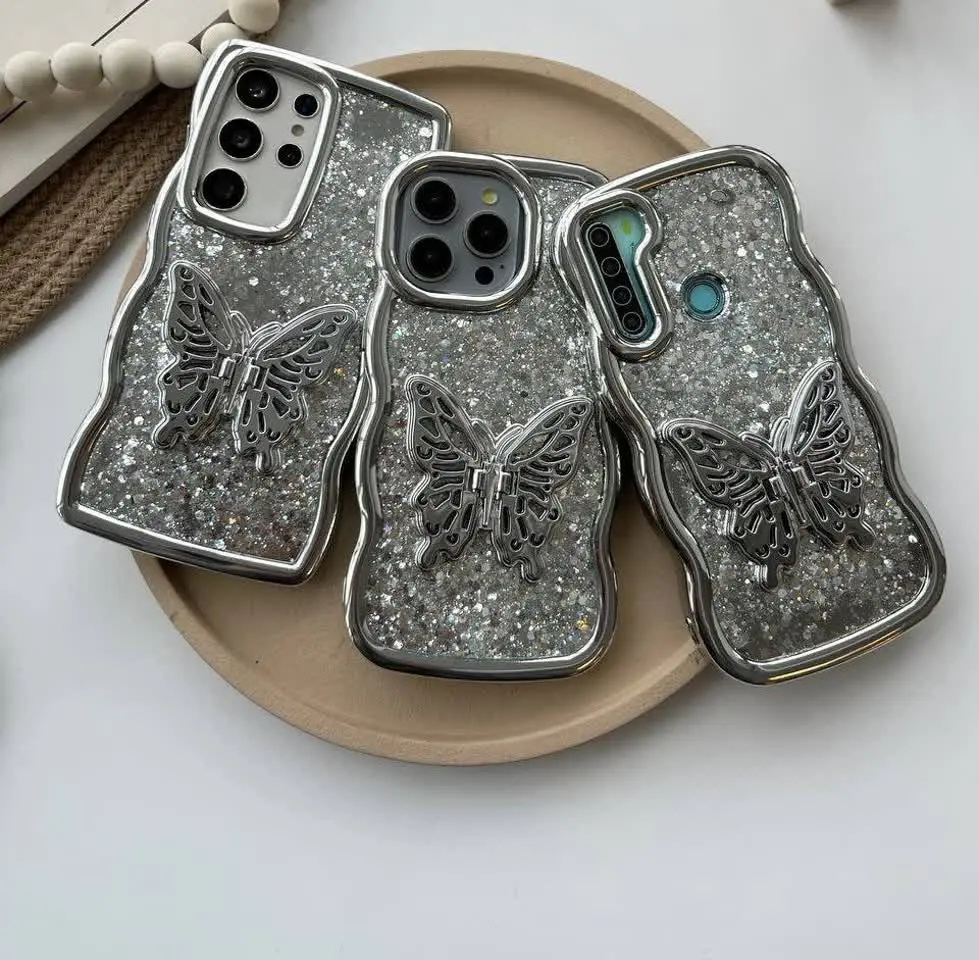 📱مدل قاب: قاب پروانه سیلور موجی شاین اکلیلی با قابلیت استند شدن بال‌های پروانه مخصوص انواع #سامسونگ #شیائومی و #آیفون 
