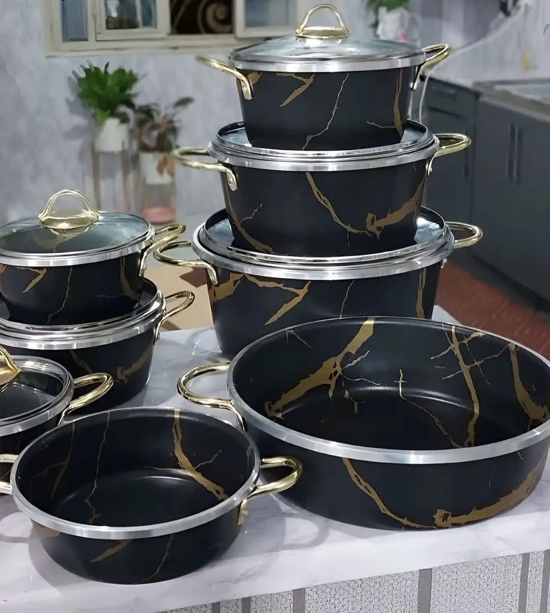 سرویس قابلمه ۱۴ پارچه طرح ماربل جدید هلنا دسته طلایی
