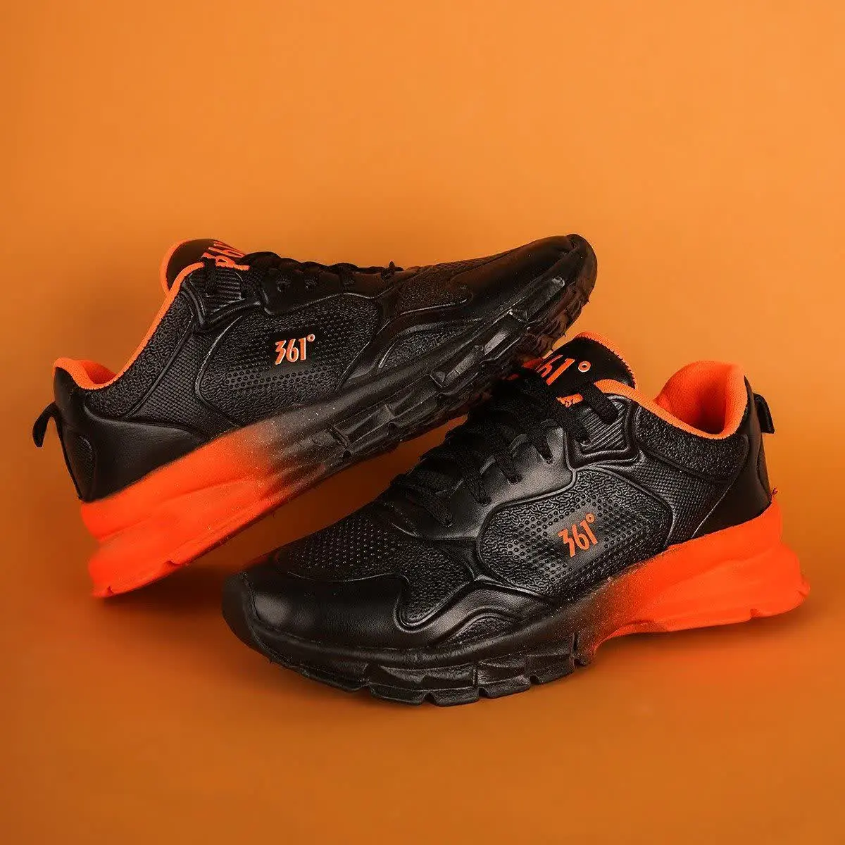 🏆کفش ورزشی مردانه مشکی نارنجی مدل ۳۶۱
