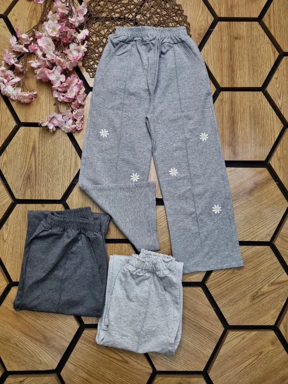 👖شلوار ملانژ بگ گل بابونه د...