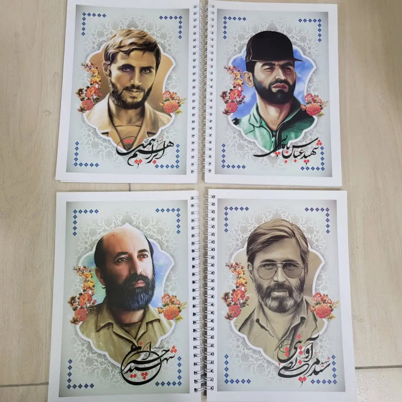 🔴 دفتر مشق سیمی جلد گلاسه ۵۰برگ شهدایی
