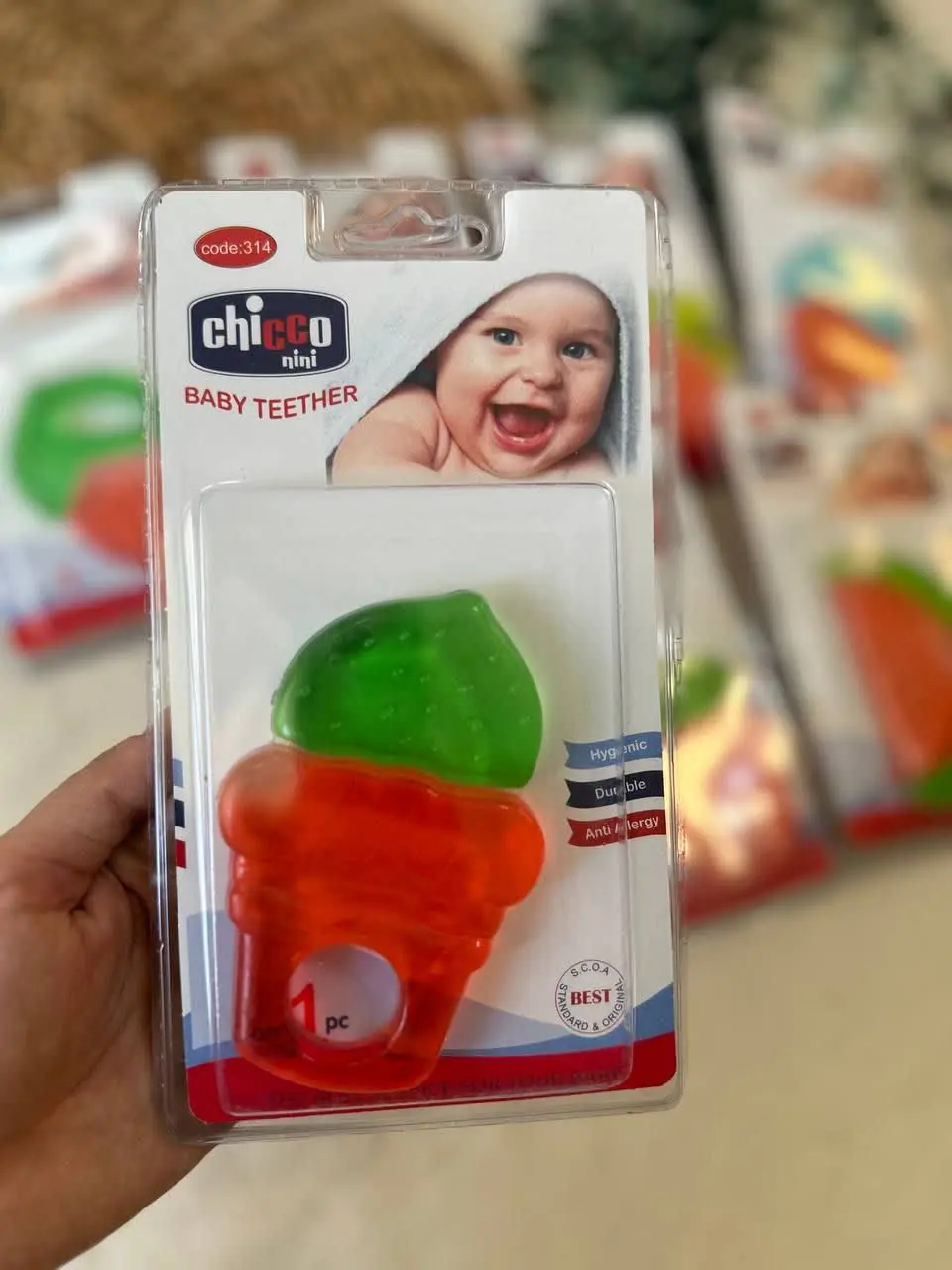 دندان گیر مایعی دو رنگ (چیکو ۳۱۴) نوزادی و کودک کد ۳۸۰۰۲ 
