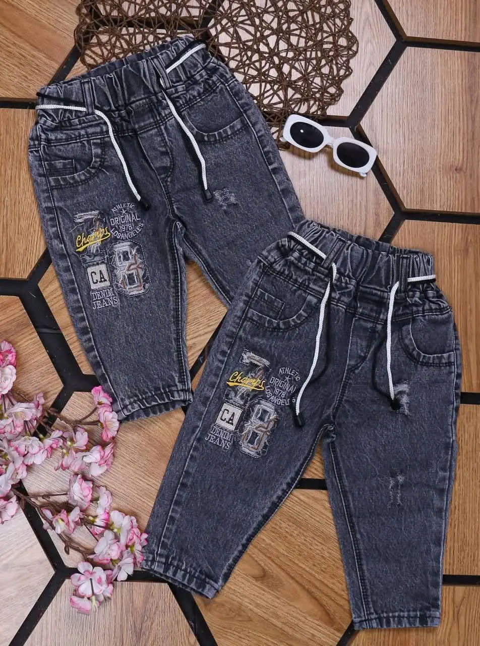 👖شلوار لی مام ذغالی👧👦 — تصویر محصول در تاپ هشتگ