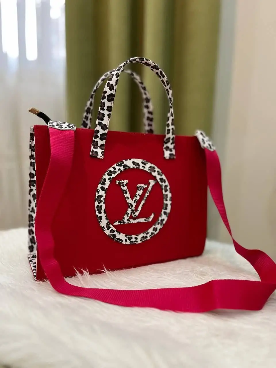 👝 کیف زنانه الوی بزرگ پلنگی
