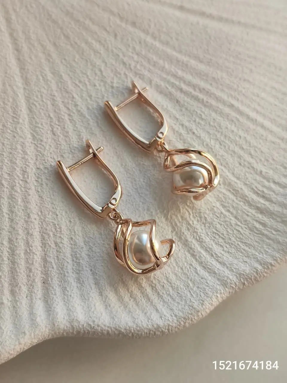 گوشواره مرواریدی از برند ژو...